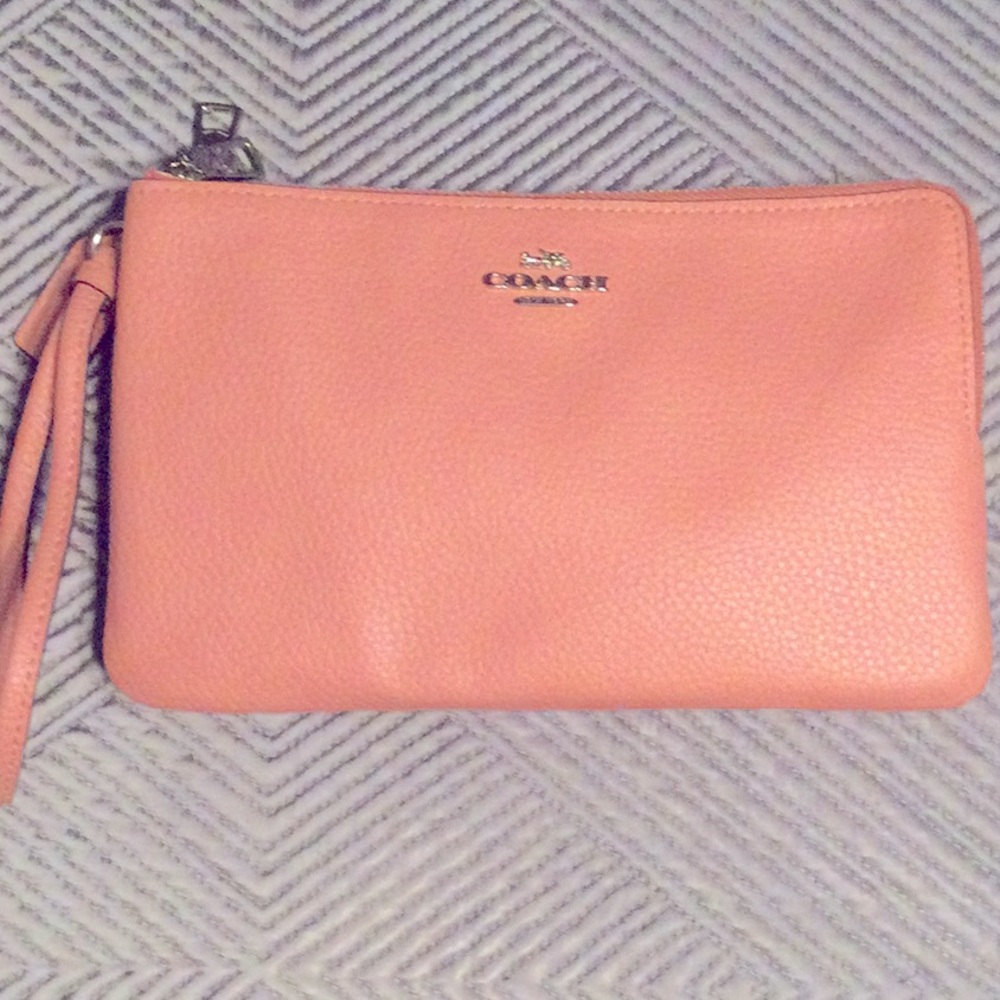 Coach pink wristlet for women